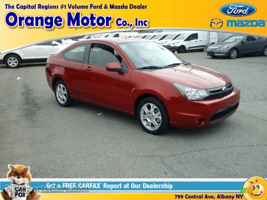 Sangria Red Metallic / Charcoal Black Ford Focus SE Coupe