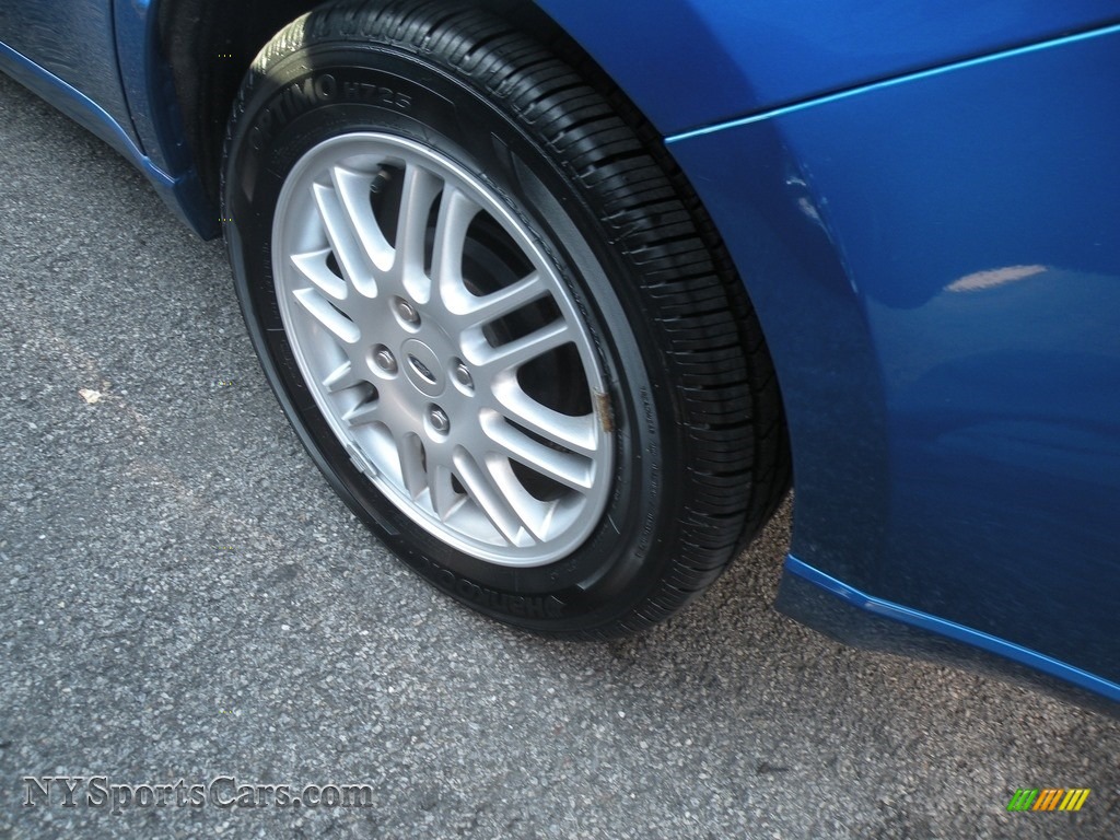 2010 Focus SE Sedan - Blue Flame Metallic / Medium Stone photo #7