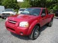 Nissan Frontier XE King Cab 4x4 Molten Lava Red Pearl photo #1