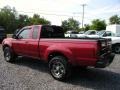 Nissan Frontier XE King Cab 4x4 Molten Lava Red Pearl photo #4