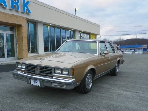 Sungold Metallic 1987 Oldsmobile Cutlass Supreme Brougham