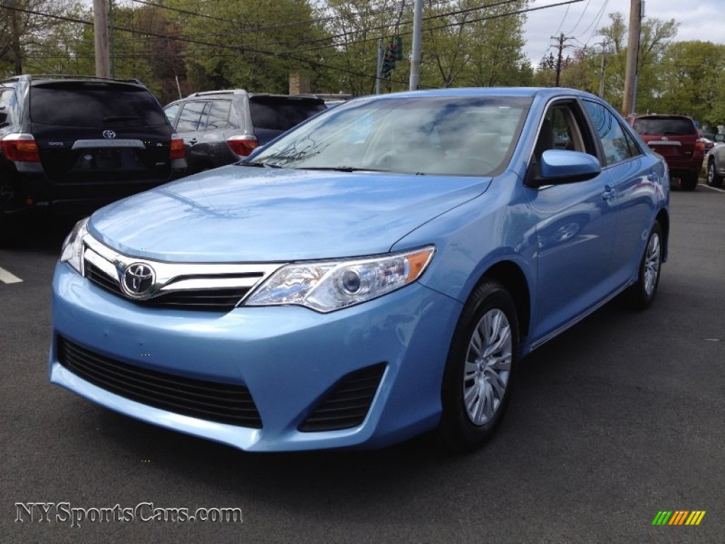 Clearwater Blue Metallic / Ivory Toyota Camry LE