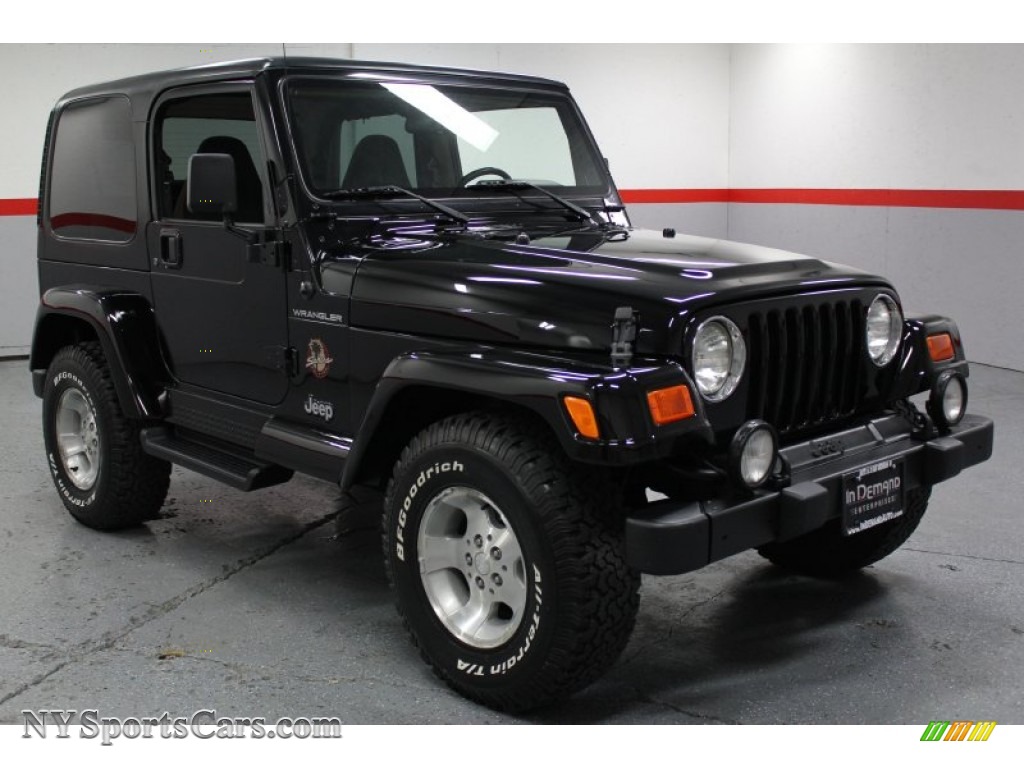 black jeep wrangler with green accents