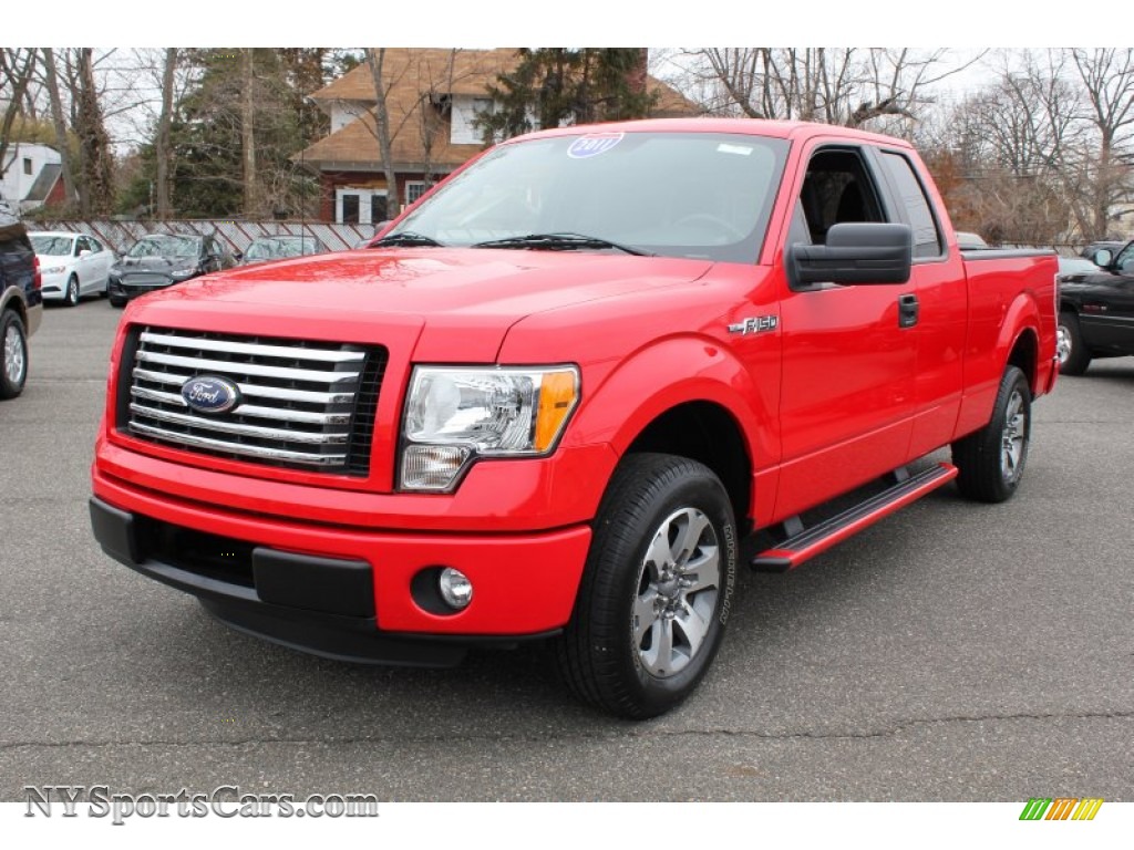 Race Red / Black Ford F150 STX SuperCab