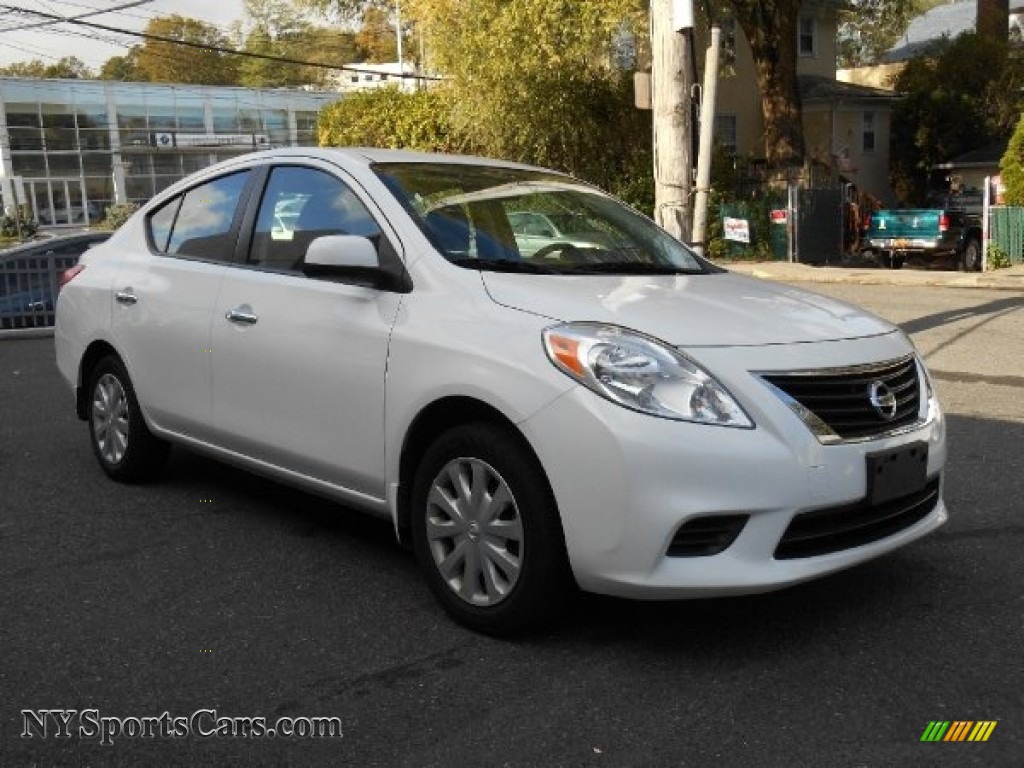 Nissan versa sedan white #7